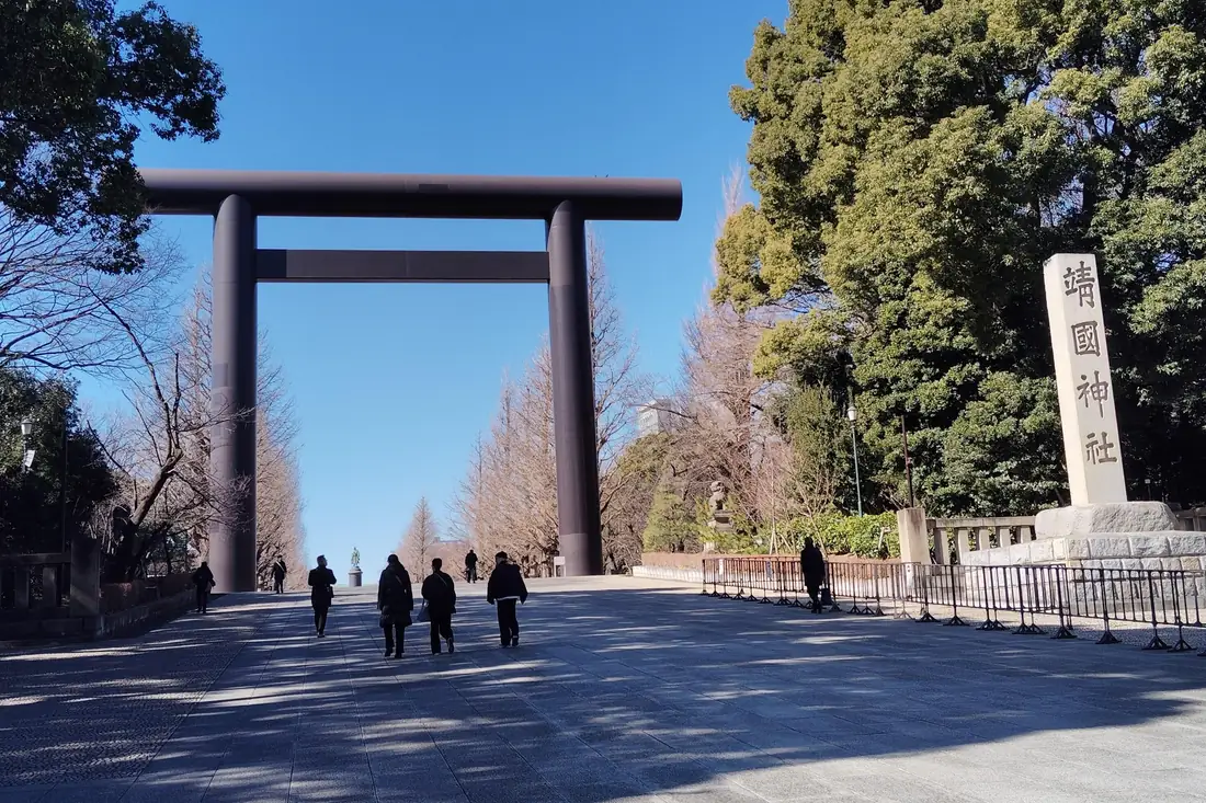 Torii gate approach to Yasukuni Shrine, home of the Yushukan, the oldest war museum in Tokyo